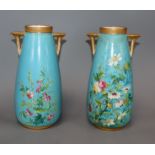 A pair of turquoise floral Worcester vases 23cm high