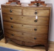 A Georgian bow-fronted chest of drawers W.114cm