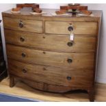 A Georgian bow-fronted chest of drawers W.114cm