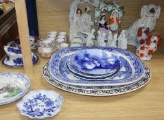 A large quantity of mixed porcelain including Staffordshire, Imari, blue and white, etc. tallest