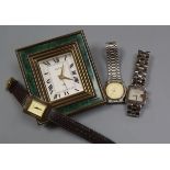 A Gucci travelling desk clock and three Gucci wrist watch including 925.