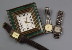 A Gucci travelling desk clock and three Gucci wrist watch including 925.