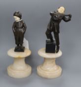 After Lemo, two bronze and ivory figures of a boy playing a lute and a boy in sallopettes tallest