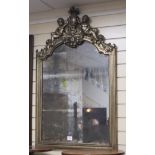 A silvered wood wall mirror with cherub crest H.108cm