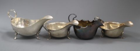 Four assorted 20th century silver sauceboats, 16.5 oz.