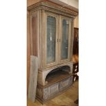 A late 19th century French limed oak glazed bookcase W.118cm