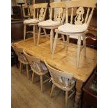 A pine kitchen table and six beech chairs L.180cm