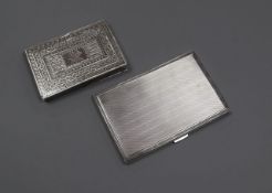 A Victorian silver card purse, Birmingham, 1868 and a George V silver cigarette case, largest 12.