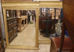 A pair of French giltwood and gesso overmantel mirrors H.139cm