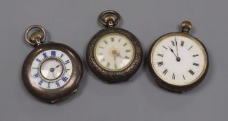 Three assorted silver and white metal fob watches.