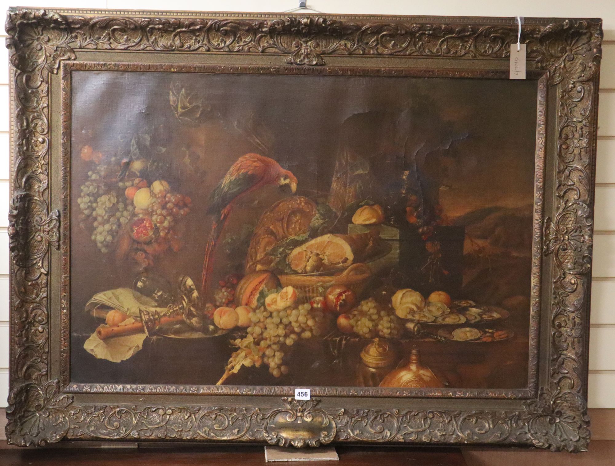 After Heem, olegraph, Still life with a parrot and fruit, ornate gesso frame, 65 x 96cm