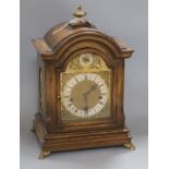 An oak chiming bracket clock