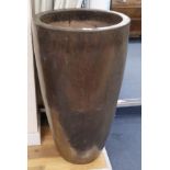 A tall gold glazed garden planter H.90cm