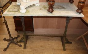 A Victorian marble top wrought iron garden table W.106cm