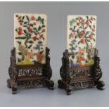 A pair of Chinese hardstone and coral table screens with hongmu stands, early 20th century, the