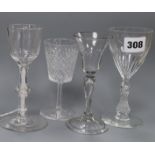 An 18th century wine glass with bucket-shaped bowl on knopped and multi-cottontwist stem and three