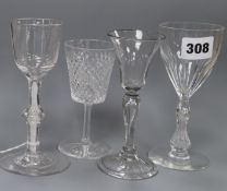 An 18th century wine glass with bucket-shaped bowl on knopped and multi-cottontwist stem and three