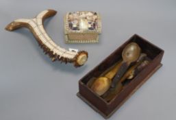 A stag antler cribbage board, a shell encrusted box and a collection of horn spoons cribbage board