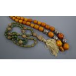 A Bakelite bead necklace and another similar