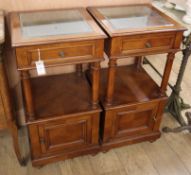 A pair of French two tier bedside cabinets H.86cm