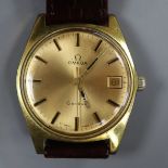 A gentleman's early 1970's gold plated and steel Omega manual wind wrist watch with date aperture,