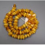 A single strand irregular shaped amber bead necklace, gross weight 73 grams, 62cm.