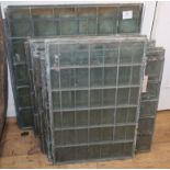 Twenty four leaded glass window panels largest 59 x 54cm