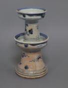 An 18th century Chinese blue and white candlestick height 22cm