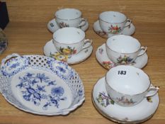 Five Herend tea cups, six Herend saucers and a Meissen blue and white basket