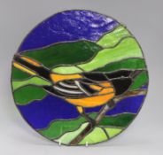 A 1970's stained glass panel depicting a Baltimore Oriole diameter 35cm