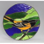 A 1970's stained glass panel depicting a Baltimore Oriole diameter 35cm