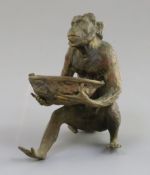 A late 19th century Franz Bergman cold painted bronze model of a monkey holding a walnut shell,