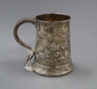 A George III later embossed silver mug, Charles Hougham, London, 1790, 12cm, 9 oz.