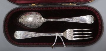 A cased late Victorian silver christening fork and spoon, Josiah Williams & Co, London, 1889.