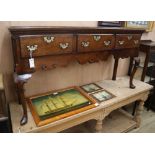 A George III style crossbanded oak low dresser W.151cm