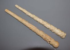 Two Chinese ivory parasol handles, late 19th century Longest 25cm