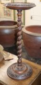 A Victorian carved walnut urn stand H.76cm