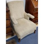 A 19th century French metamorphic armchair, with folding armrest