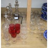 A quantity of mixed glasses and decanters, etc.
