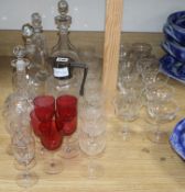 A quantity of mixed glasses and decanters, etc.