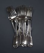 A harlequin set of twelve George IV/William IV silver fiddle pattern dessert forks, 18 oz.