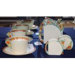 A Clarice Cliff Newport Pottery Bizarre tete-a-tete, Stamford shape, comprising teapot, milk jug and