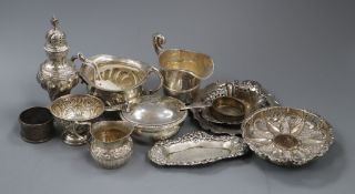 Assorted small silver including two cream jugs, four dishes, sugar bowl, caster, napkin rings etc.