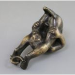 A 19th century bronze oil lamp in the form of an acrobat after Riccio, 5.5in.