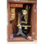 A 19th century mahogany cased microscope