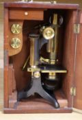 A 19th century mahogany cased microscope