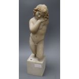 A simulated marble resin figure of a naked youth height 50cm