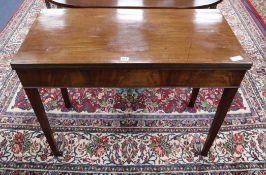 A George III mahogany folding tea table W.96cm