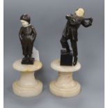 After Lemo, two bronze and ivory figures of a boy playing a lute and a boy in sallopettes tallest