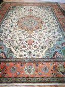 A Tabriz carpet 405 x 305cm